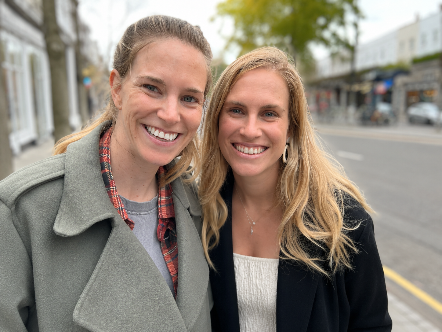 Nicky and Coral, co-founders of Fern, standing together on a London street